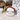 Festive Cat Door Stopper with plaid details and earmuffs adding a touch of cozy décor to any room.