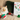 Cat with Christmas decorations and a 'Merry Christmas! Pet Advent Calendar' on a couch.