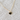Black enamel curled cat heart pendant on 18K gold chain