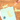 Colorful notebook with cat-shaped cutouts on a wooden surface