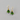 Cat in Christmas tree earrings with dangling tail