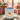 Cats and Books Coffee Mug with orange tabby napping on books