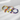Both color options of the Heart Cat Collar laid side by side on a white background