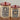 Functional and fun canisters for storing packaged cat treats