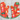 Set of 2 red oven mitts with festive cats climbing Christmas trees.