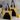 Two tote bags with black cat designs and text on a white background