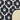 Patterned fabric with paw prints on a black and white background