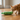 Green pickle-shaped Pickle Catnip Kicker Toy on a white background.