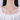 Necklace with a pendant on a mannequin wearing a white top