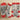 Set of socks with cat-themed designs and red accents on a white background