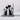Black metal bookend featuring two cat silhouettes standing upright.