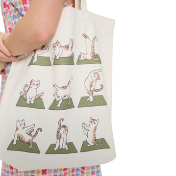 Feline Finesse! Close-up of our Yoga Cat Tote Bag, showcasing detailed illustrations of cats gracefully practicing various yoga poses.