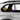Diamond-shaped cat travel sign displayed inside car window