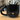 Black Cat Mug shaped like a cat with gold-accented face, perfect for coffee or tea lovers.