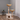 Cat tree with multiple levels and perches in a room with a gray wall and wooden floor.