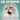 A square 2027 calendar cover titled "CAT-ASTROPHE" featuring a close-up photo of a fluffy gray cat with its mouth open, set against a teal background with bold white text.
