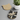 Two cat-shaped coasters, one made of cork and the other of felt with a ribbon, on a white background.