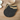 Cat-shaped coasters with black and beige design on a white background