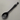 Black cat-shaped spoon on a white background