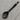 Black cat-shaped spoon on a white background