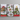 Three Christmas-themed kitchen towels with cat designs on a green background