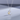 Necklace with a moon and star pendant on a light gray background
