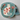 Round embroidered pouch with a cat design on a blue background
