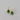 Cat in Christmas tree earrings with dangling tail