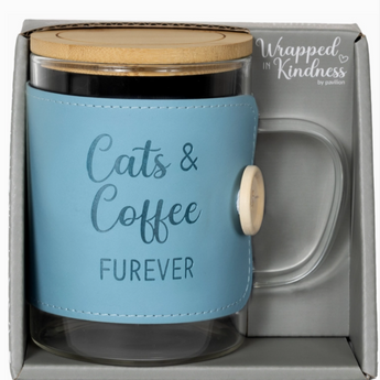 Close-up of engraved Cats & Coffee Furever sentiment on teal wrap with tan button and white elastic closure.