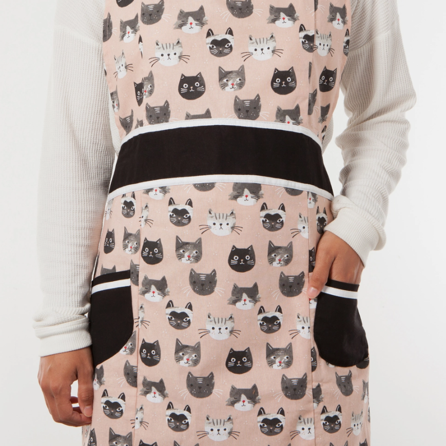 One size fits most - Cat's Meow Betty Apron with 30" hem and 34" length.
