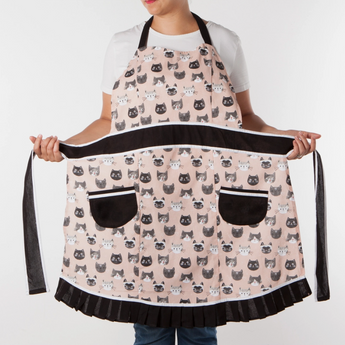 Close-up of vintage-inspired sweetheart neckline and pleats on Cat's Meow Betty Apron.