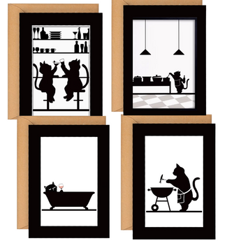 Four black cat prints displayed in elegant black frames against a white wall.