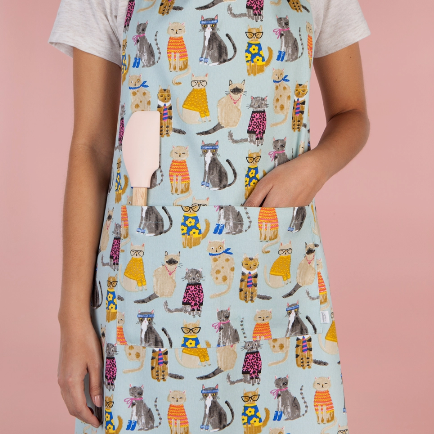 One size fits most - Feline Fine Apron with 28" width and 32" length.