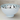 Microwave and dishwasher safe serving bowl with charming cat faces design.