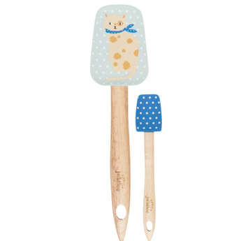Set of two cat-themed spoonulas with bamboo handles, featuring a beige cat with a blue scarf on one spatula and white polka dots on a dark blue background on the other.