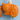 An orange cat-shaped soap bar with a knotted rope loop at the top, shown against a light blue tiled background.