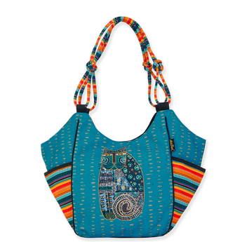 Image showing vibrant blue canvas tote bag with golden polka dots and colorful cat motif on front.