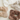 Set of fluffy scrunchies in various colors on a light background