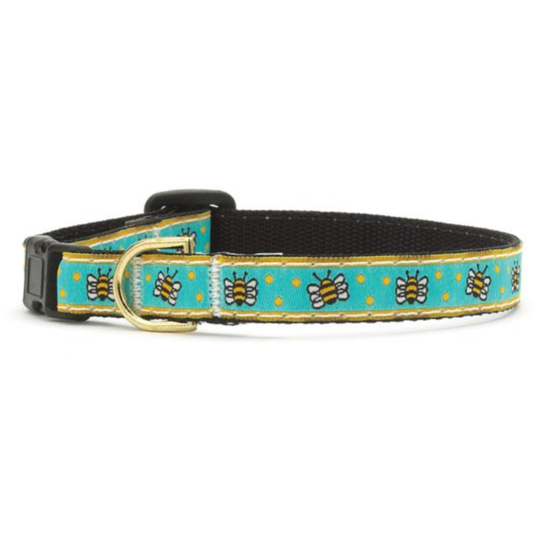 Honey Bee Cat Collar: Light blue collar with embroidered bees, yellow polka dots, and adjustable design (8"-12"). Breakaway Buckle for safety, made in the USA, giving your cat a buzz-worthy style.