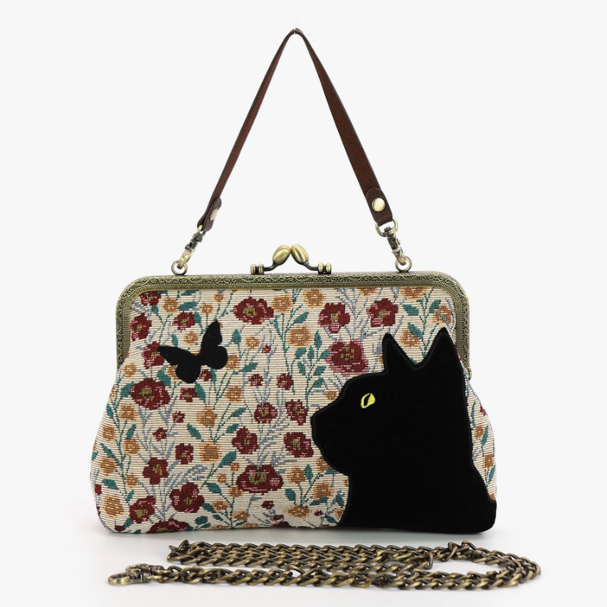 Kiss Lock Black Cat Purse - A stylish black cat and floral embroidered canvas bag with a kiss lock closure, perfect for a touch of feline flair in your wardrobe.