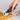 Kitty Cut Pizza Cutter slicing through a pizza effortlessly