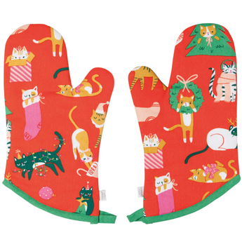 Set of 2 red oven mitts with festive cats climbing Christmas trees.