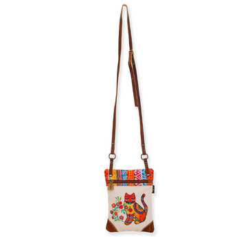 Cream canvas purse with brown straps and cat design, ideal for cat lovers.