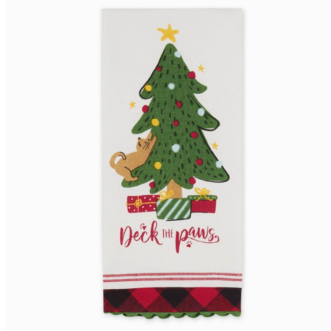 Witness the festive mischief as a cat expertly climbs a Christmas tree, featured on a charming 100% cotton towel.