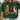 Person wearing a cream sweatshirt with Christmas-themed cat illustrations.