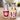 Two cat-shaped salt and pepper shakers with 3D glasses and popcorn, one in a cola cup and the other in a popcorn container.