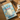 Book cover with cat illustrations and a photo placeholder