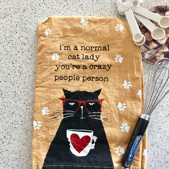 Cat Themed Kitchen Towel Featuring the Words I'm a Normal Cat Lady You're a Crazy People Person Printed on the Front