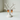 Cat-shaped earrings on a white background