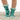 Teal socks with black paw prints and light blue fuzzy cuffs worn by a person on a white background